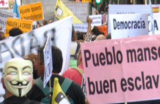 Un manifestante con la máscara de Guy Fawkes.