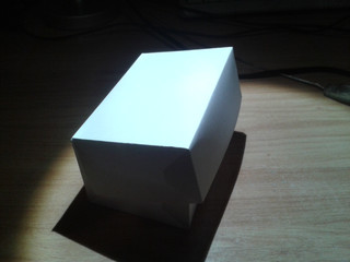 Caja pegada y cerrada.